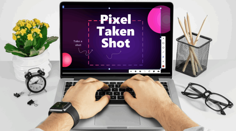 opened laptop with PixelTaken tool on the screen