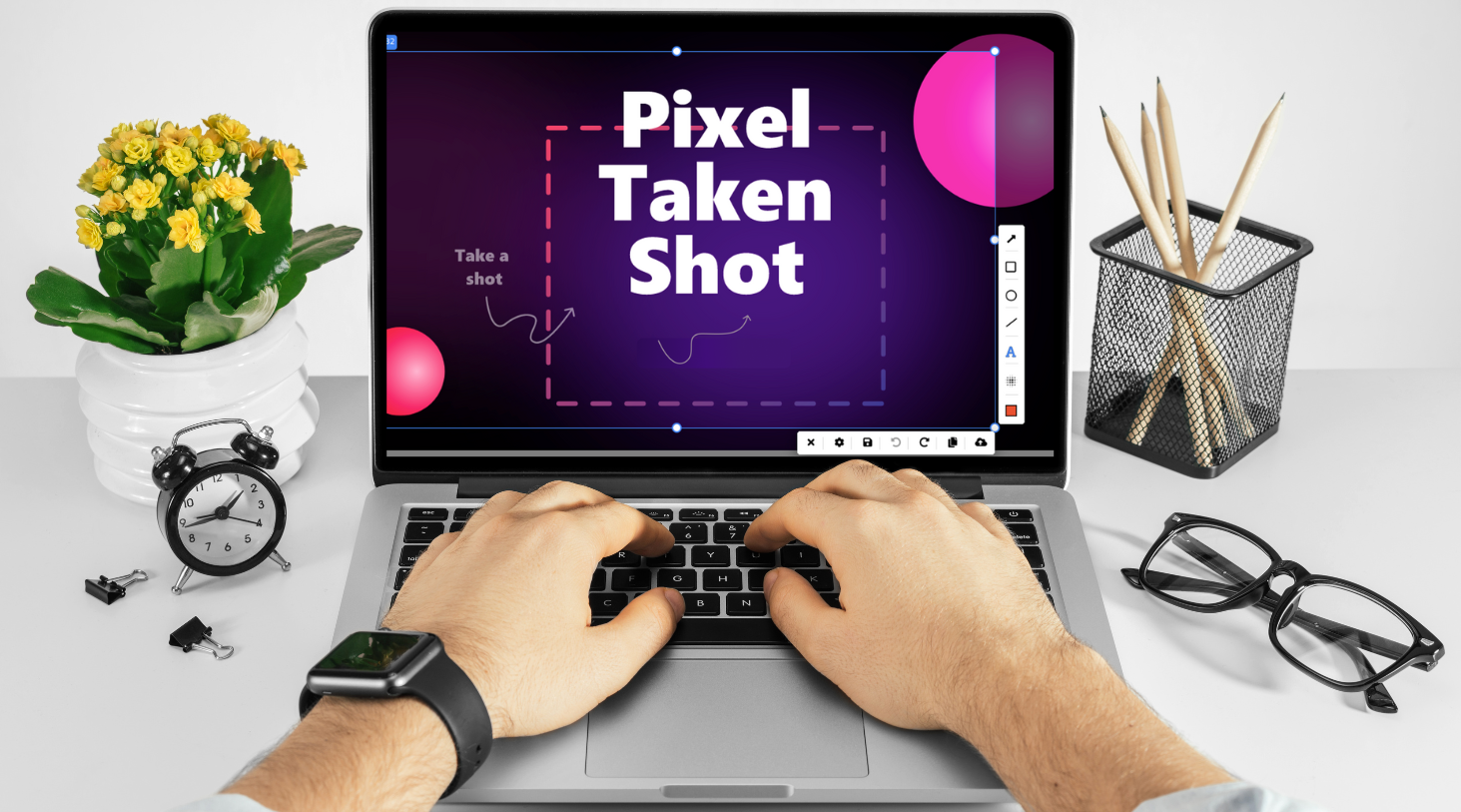 opened laptop with PixelTaken tool on the screen